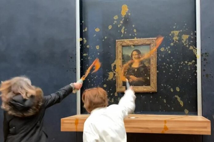 gioconda_louvre_attivisti_afp